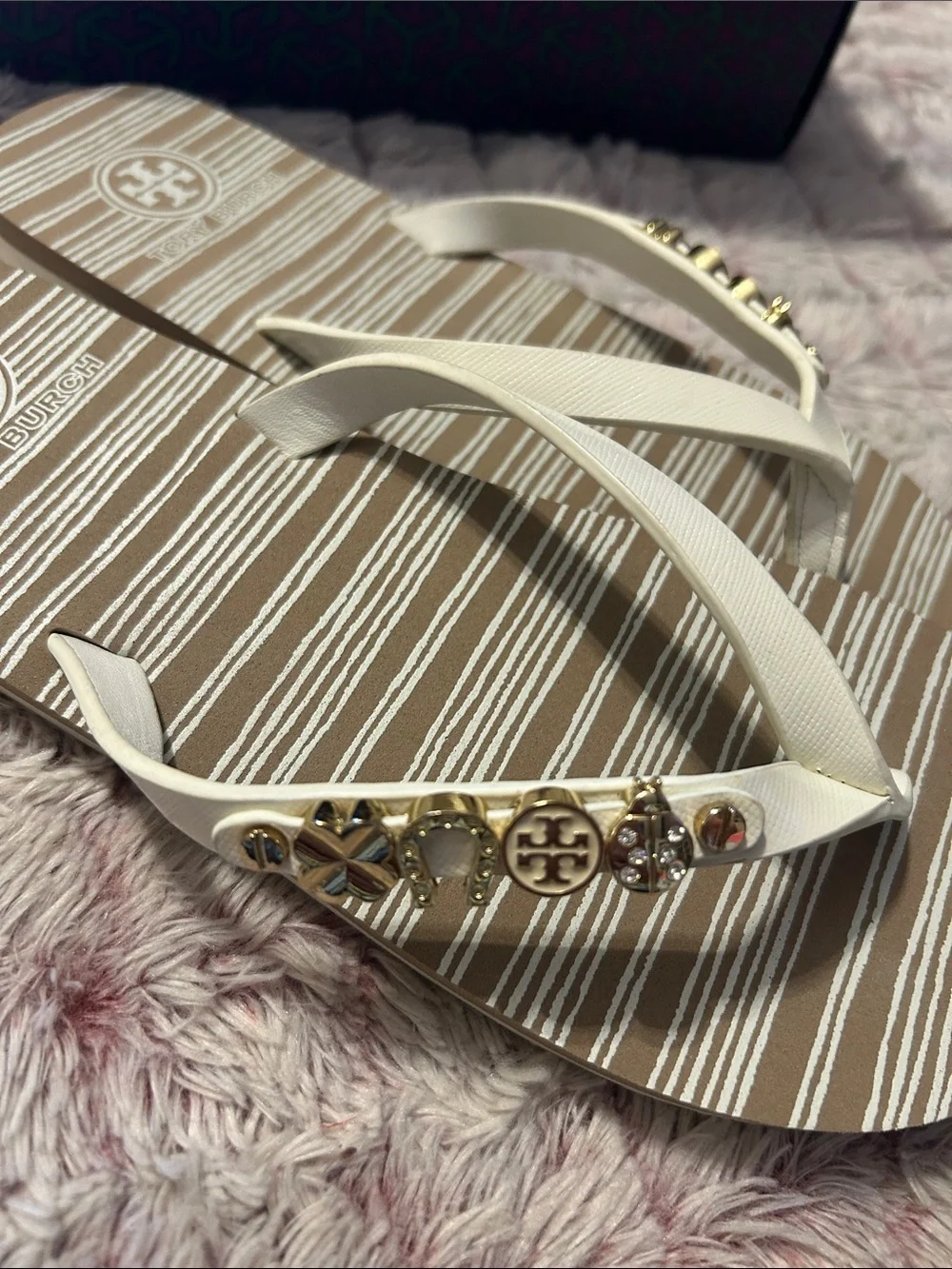 Tory Burch White Strap Striped Footbed Flip Flops with Gold Logo Charms size 9